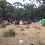 tents, camp fire, group photo